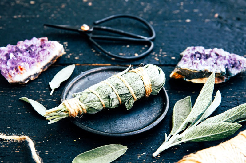 Sage and crystals for a house blessing ritual.