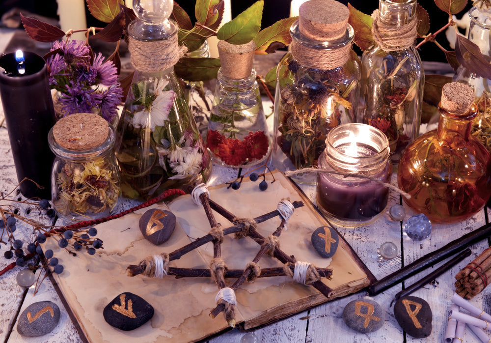 An altar with various Pagan supplies. Candles, crystals & more are perfect pagan altar supplies.