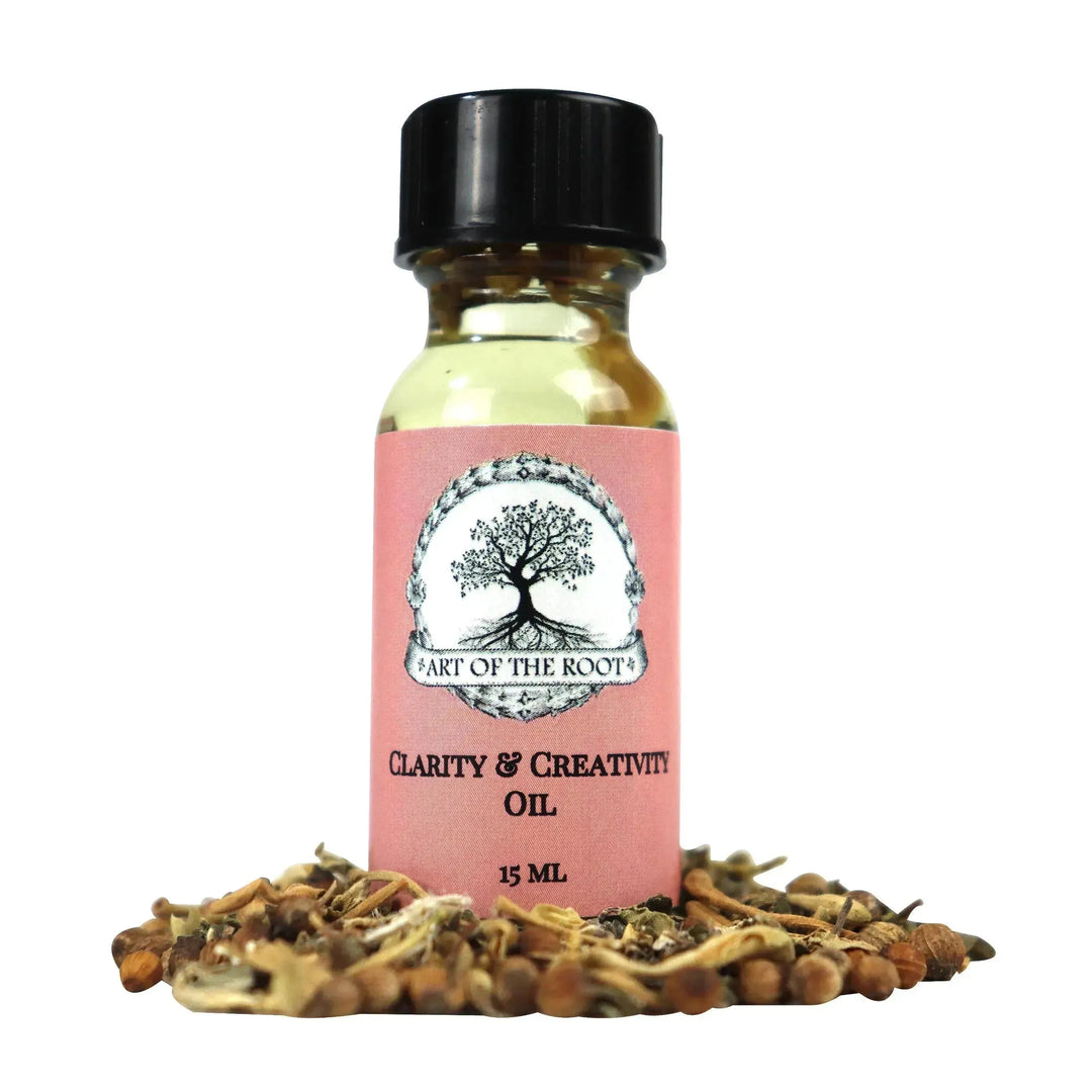 A bottle of handmade Clarity & Creativity Oil. Try this essential oil for creativity in rituals.