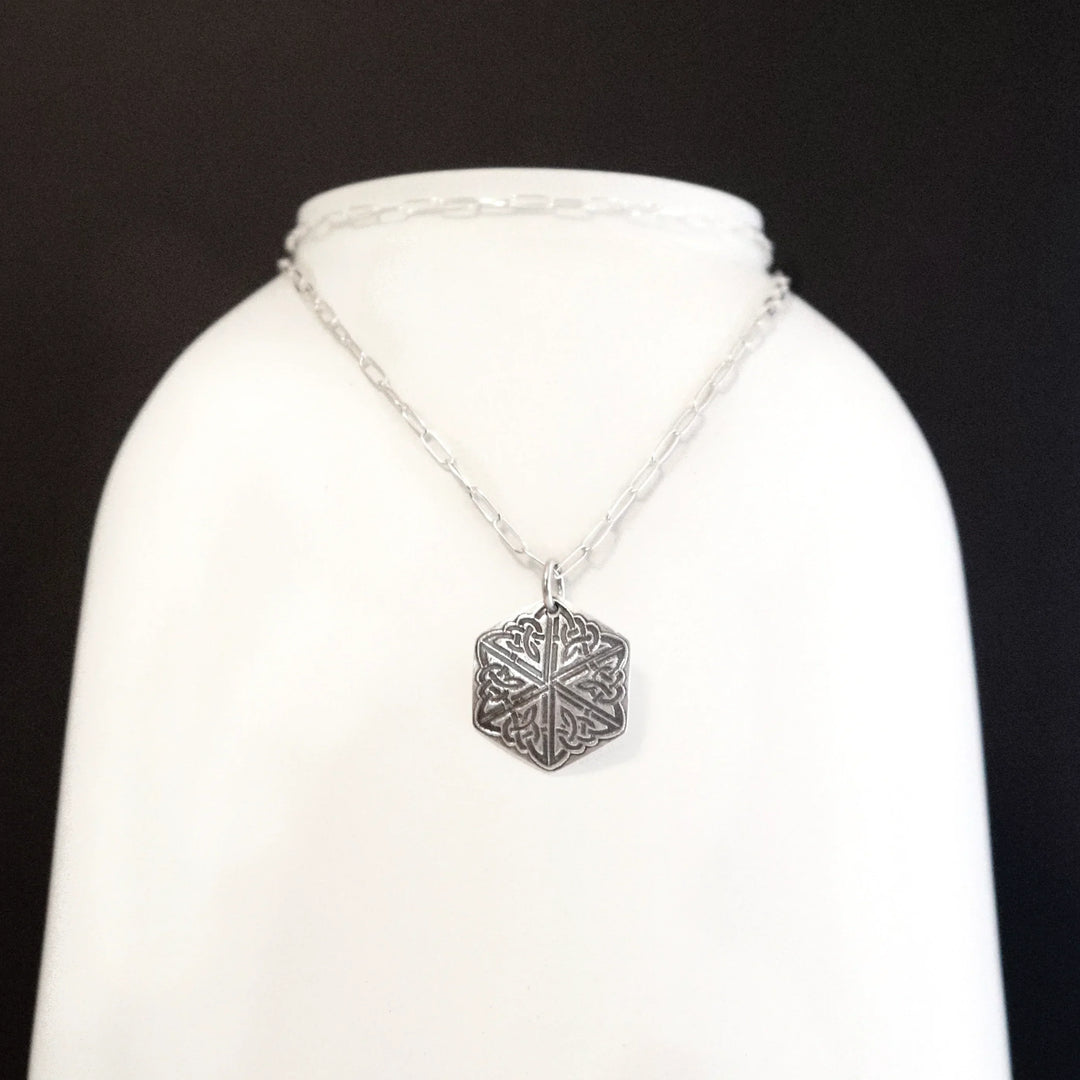Sterling Silver Celtic Knot Necklace on White Background