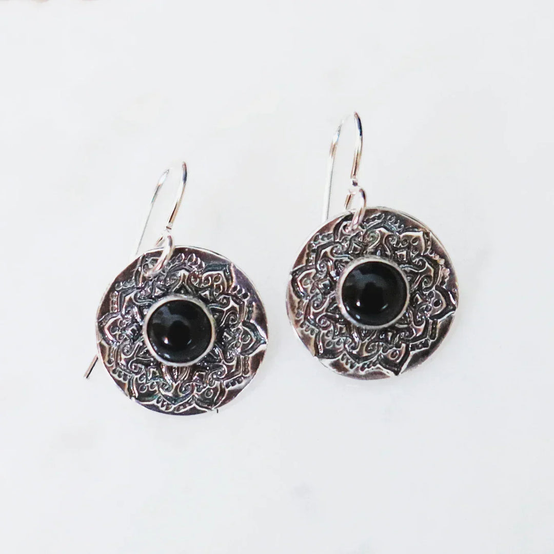 Handmade Silver Mandala Earrings with Black Onyx Healing Crystals on white background.