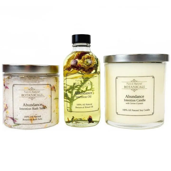 Abundance Ritual Spa Set by Art of the Root with candle, oil, and bath salts for prosperity rituals.