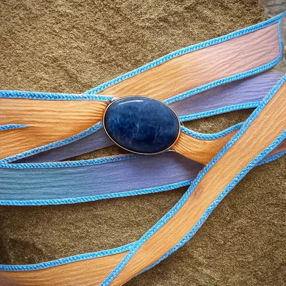 Dyed silk wrap bracelet with sterling silver sodalite setting