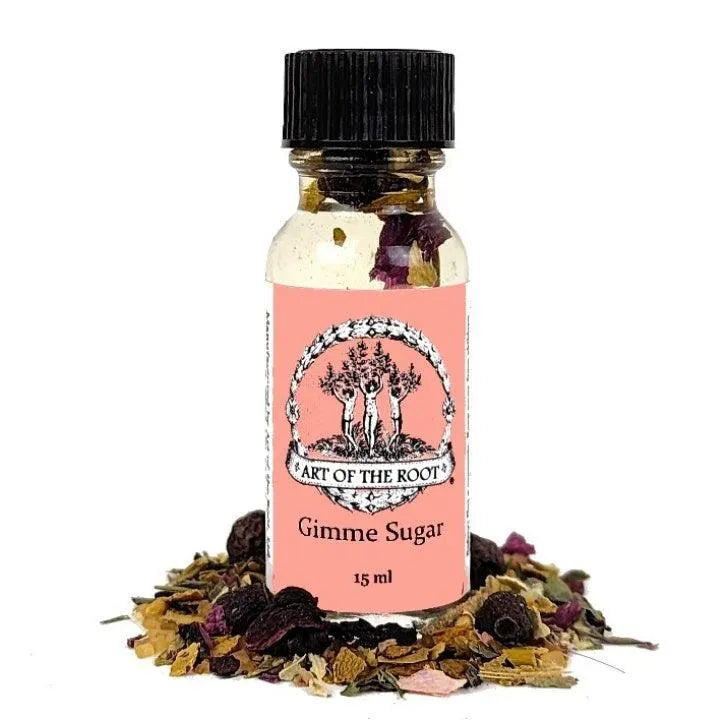 A bottle of Art of the Root's Gimme Sugar Oil. Use this oil for sweetness during a ritual.