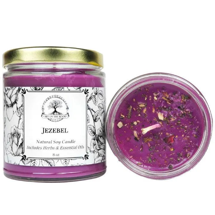 A handmade Art of the Root Jezebel Candle to attract rich men and find love.