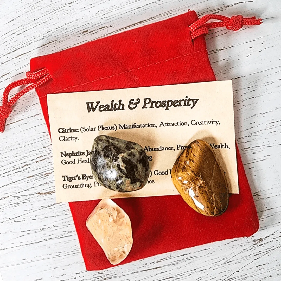 Art of the Root's crystals for prosperity set with Tiger's Eye, Citrine, and Nephrite Jade.