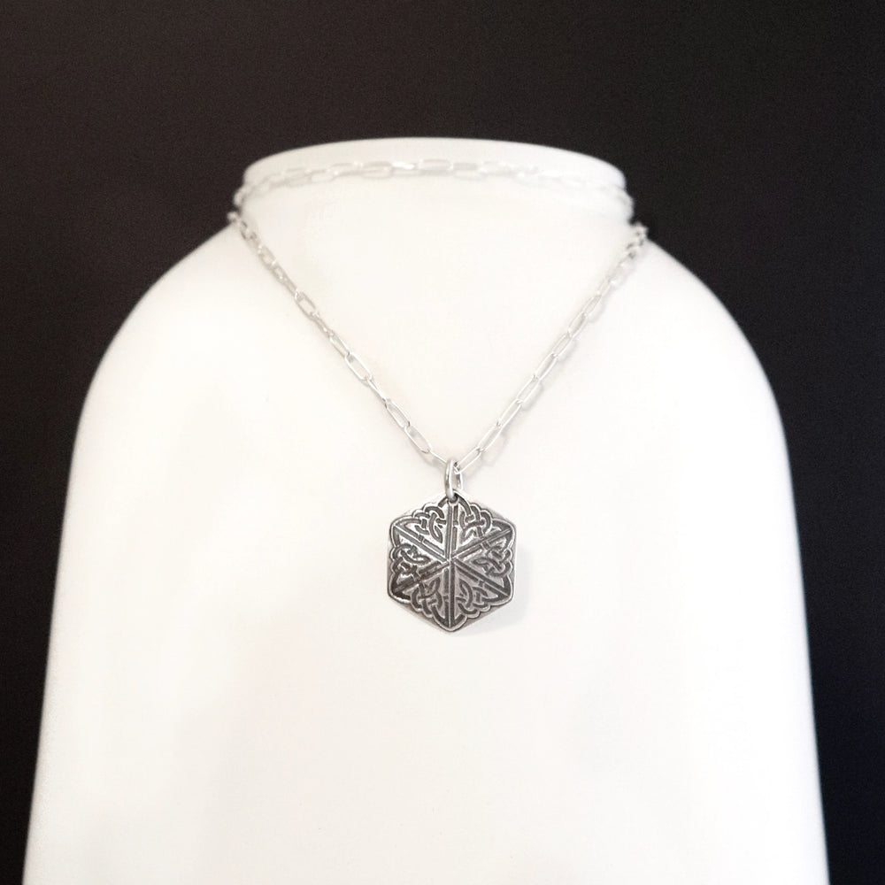 Sterling Silver Celtic Knot Necklace on White Background