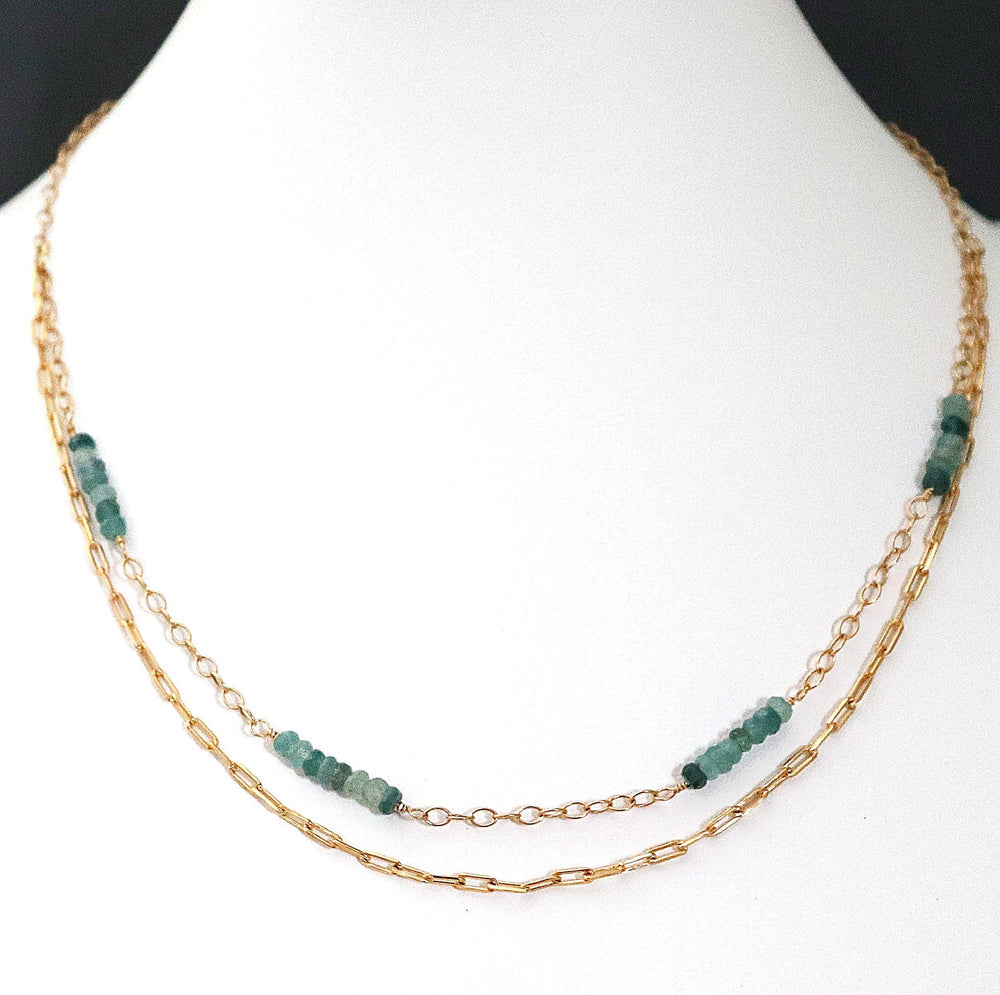 Grandidierite gemstone layered necklace on white display bust with paperclip and cable chain