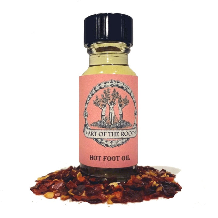 A bottle of Art of the Root's handmade Hot Foot Oil for magick and hot foot tracking rituals.