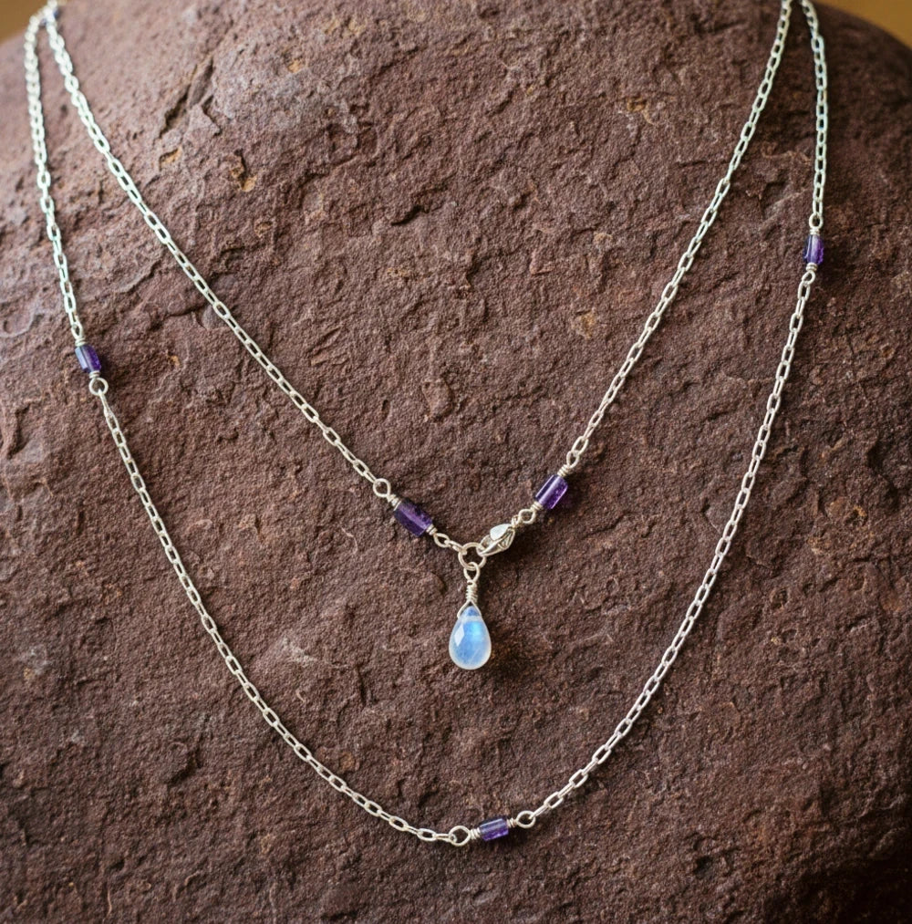 Sterling Silver Iolite and Moonstone Layered Necklace Displayed on Natural Rock