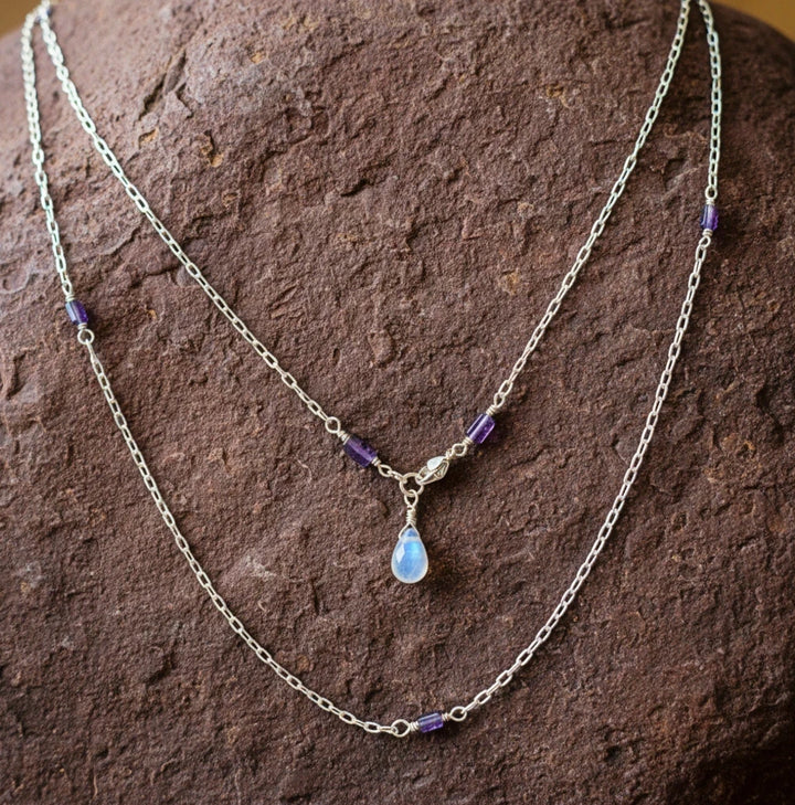 Sterling Silver Iolite and Moonstone Layered Necklace Displayed on Natural Rock