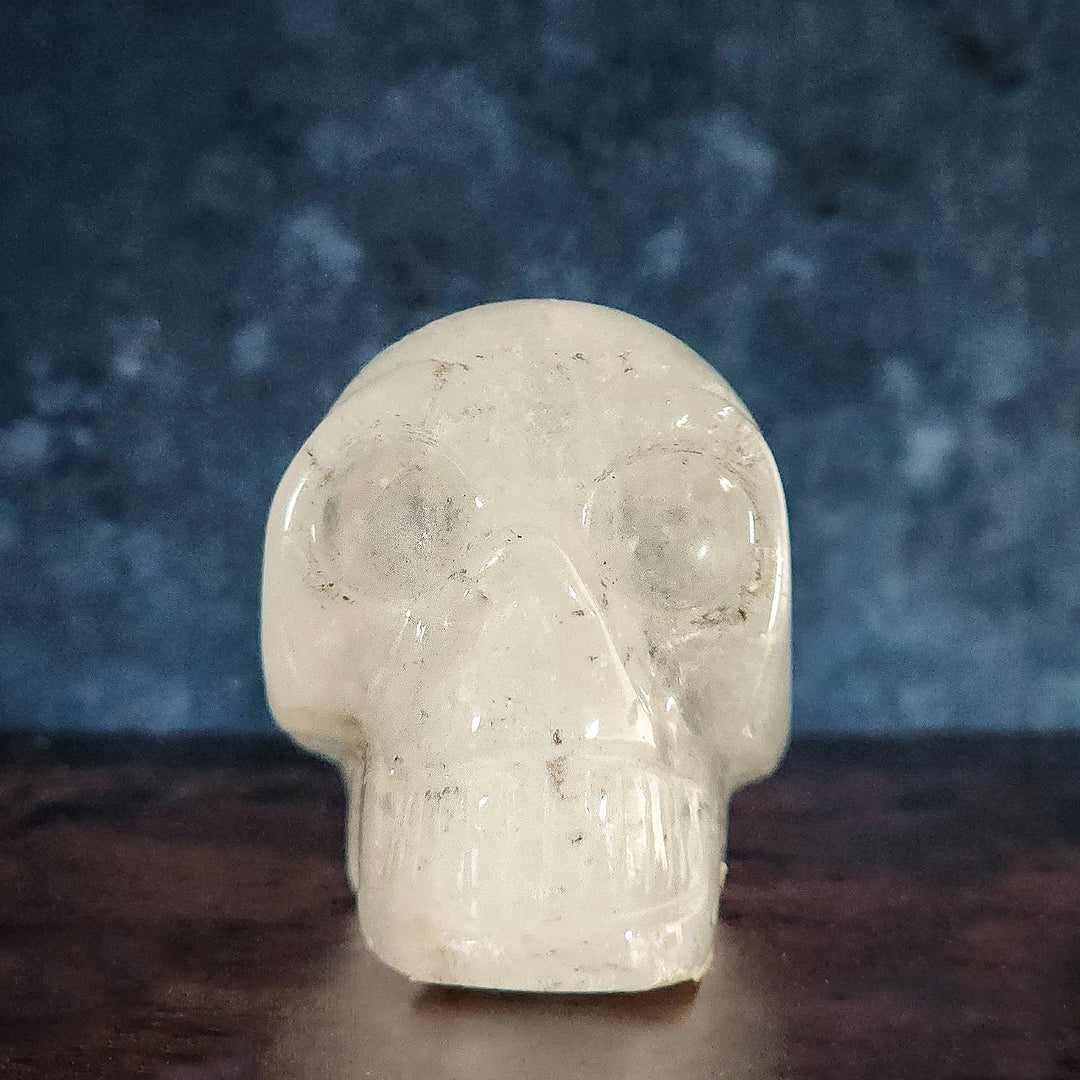 A clear quartz skull. Shop clear quartz and altar supplies at Art of the Root.