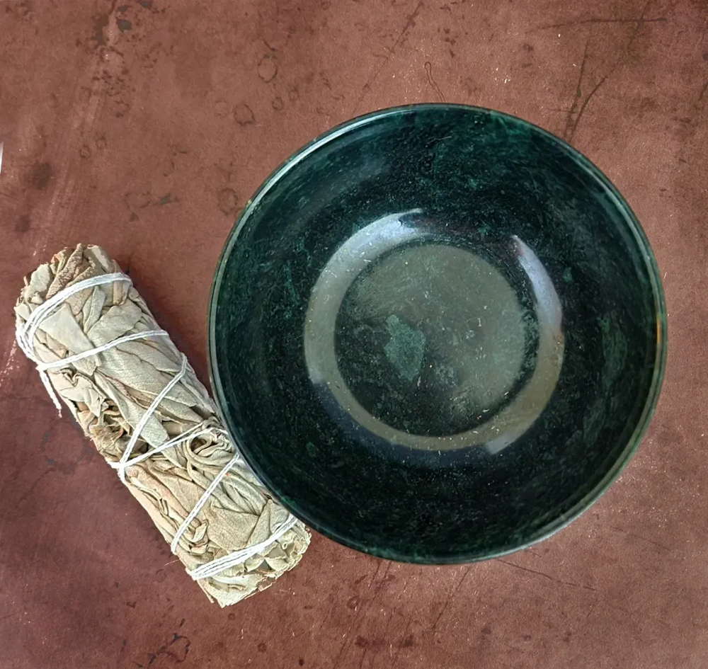 Top view of a sage stick in a beautiful Hsiuyen Jade Bowl available at Art of the Root online.