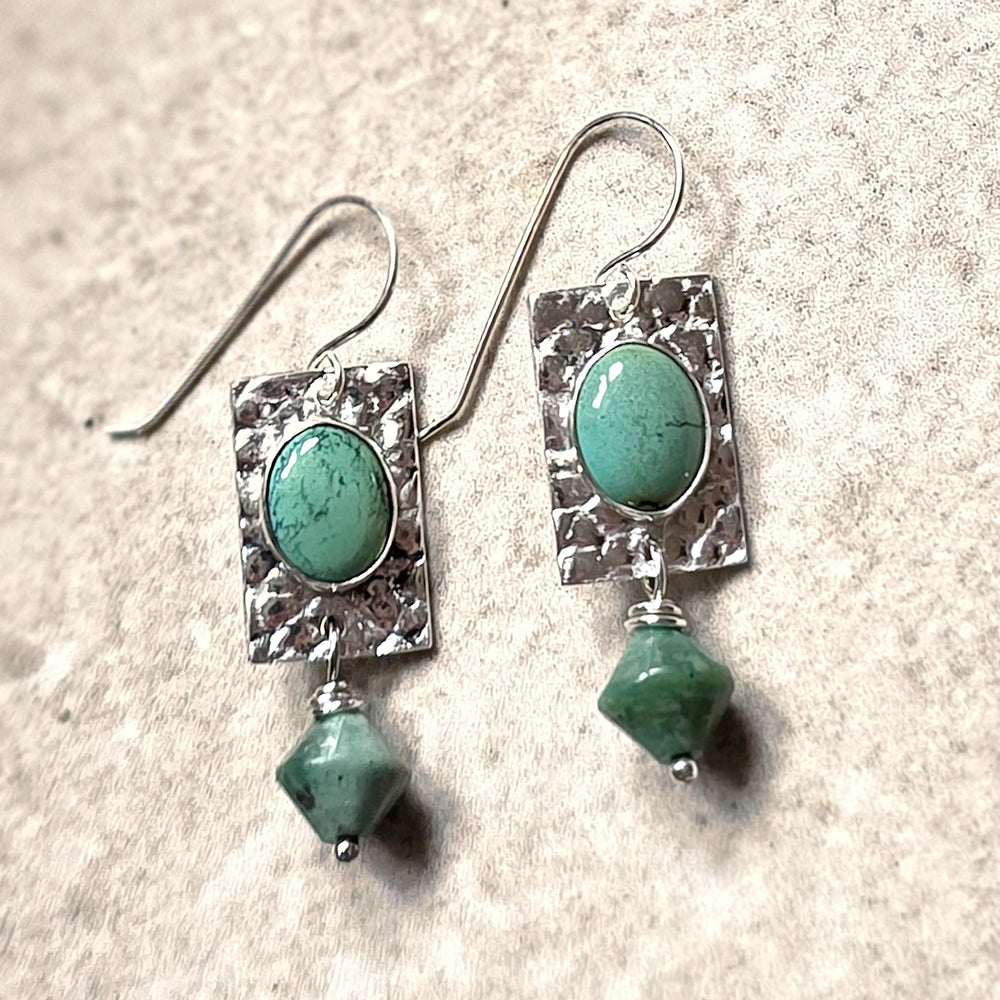 Handcrafted Turquoise and Silver Dangle Earrings – Textured Gemstone Jewelry Flat Lay