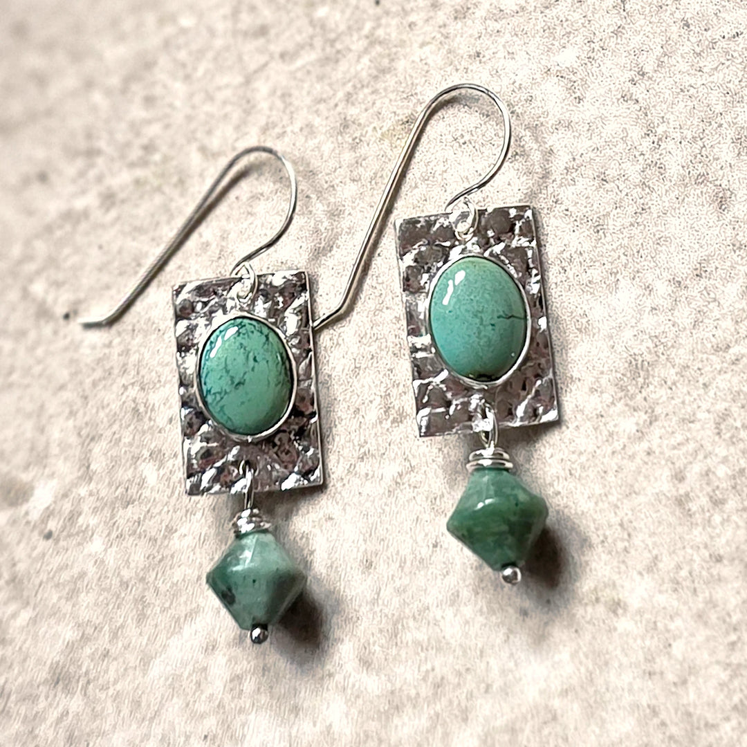 Handcrafted Turquoise and Silver Dangle Earrings – Textured Gemstone Jewelry Flat Lay