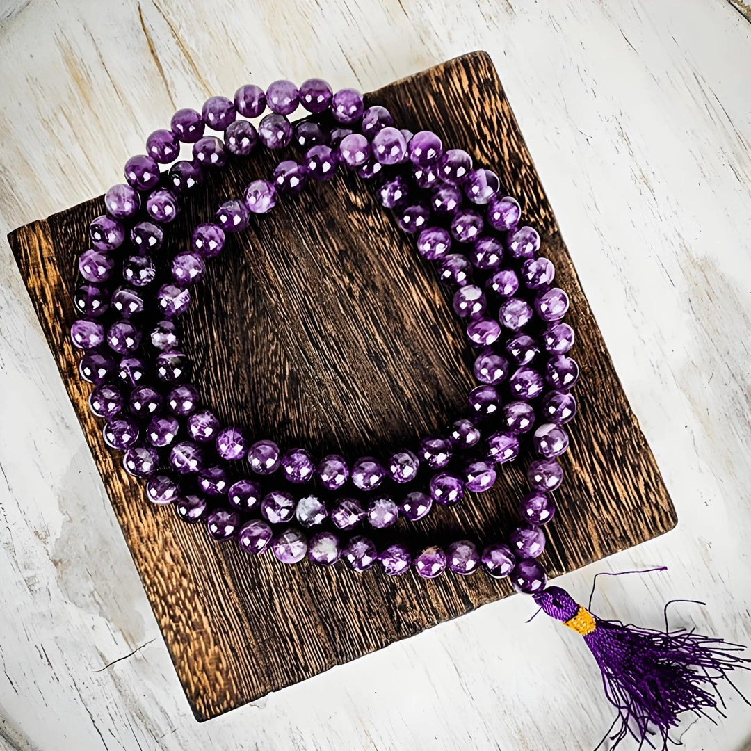 Amethyst Mala Beads from Art of the Root can be worn as a necklace or bracelet.