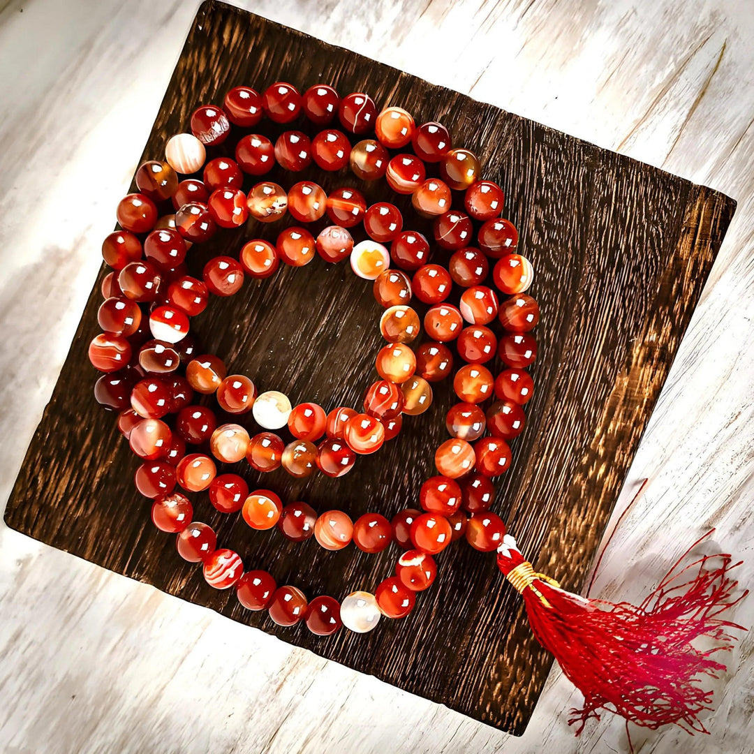 Handmade Red Carnelian Crystal Mala Beads by Art of the Root for rituals and magick.