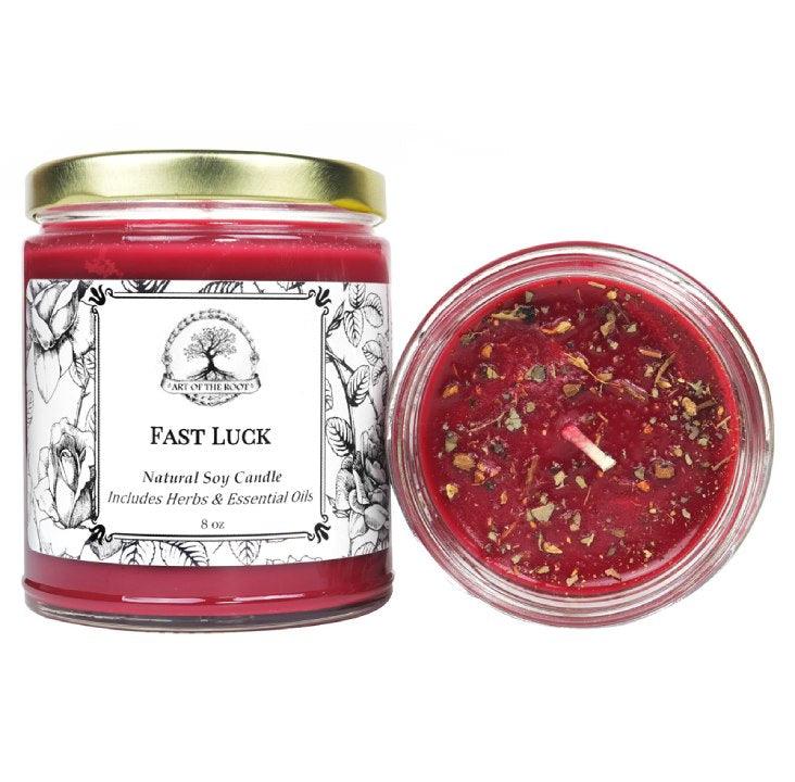 A handmade, soy Fast Luck Candle by Art of the Root. Attract luck when burning this candle.