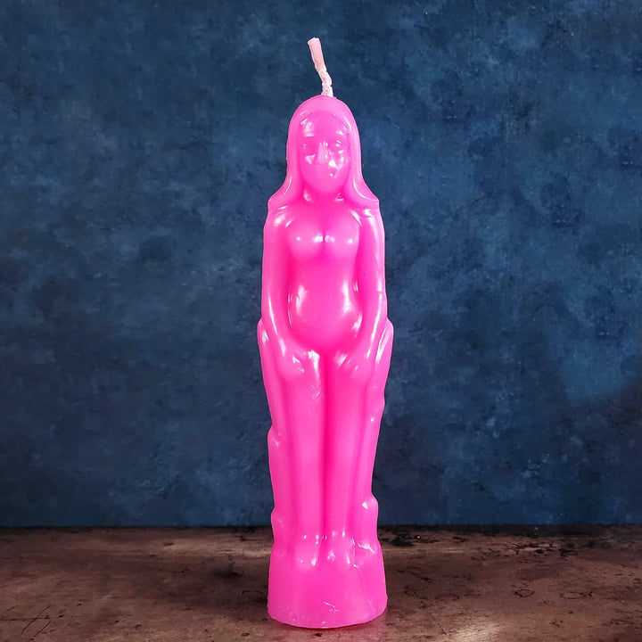 A pink woman candle for enhancing love rituals and spells from Art of the Root.