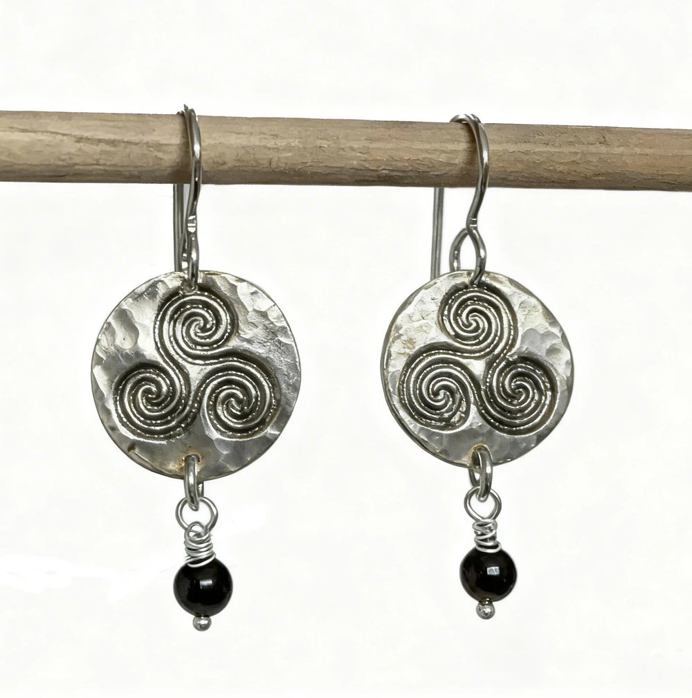 Triskele fine silver earrings with black onyx bead and hammered silver disc