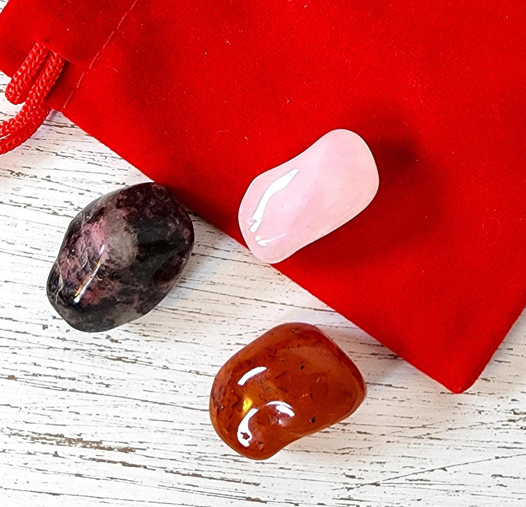 Rose Quartz, Rhodonite, and Carnelian Crystals. Shop this Love Crystal Set from Art of the Root.